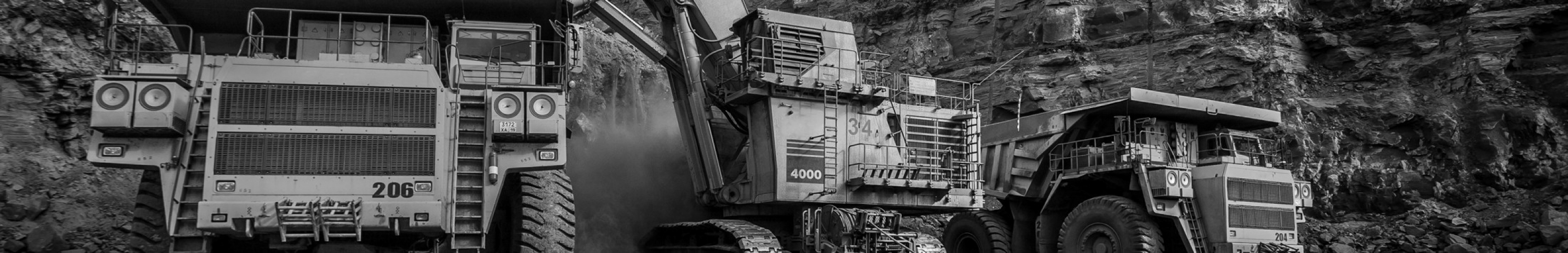 Sears Mining Products. Picture of three large mining machines.